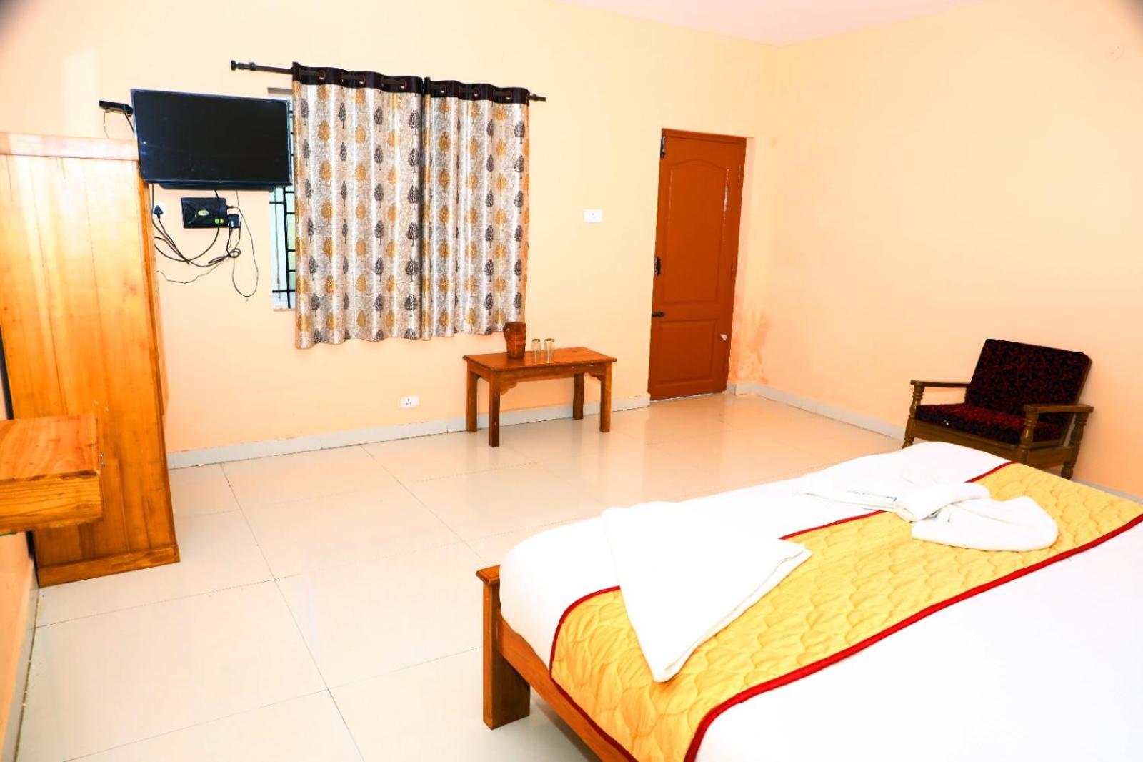 J J Homes Ooty Pokoj fotografie